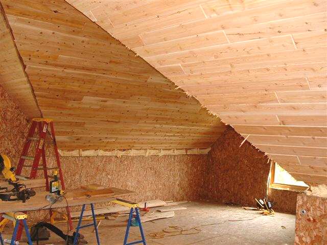 tongue and groove wood ceiling going up over the SIP panels in the cathedral ceiling