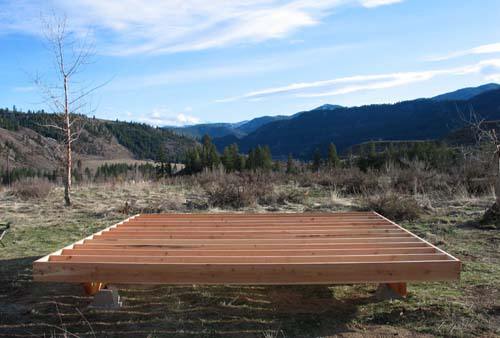 the square 16x16 floor platform framed with 2x10 joists and set on the pier foundation