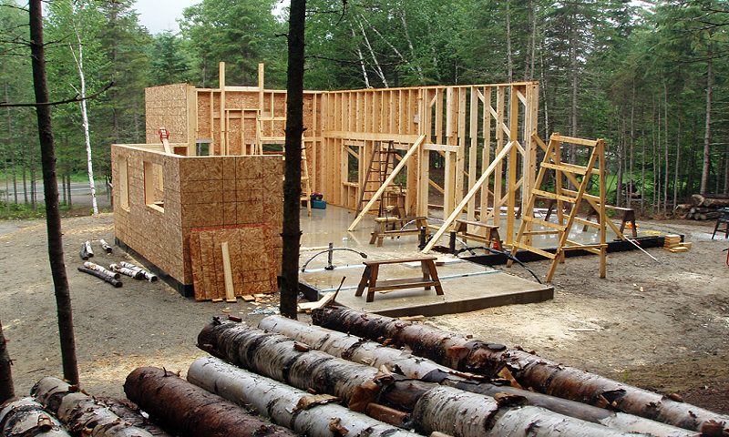 wall framing going up on the poured slab
