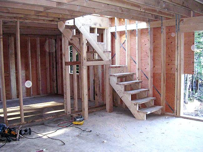 stairway framing with bedroom and bath behind