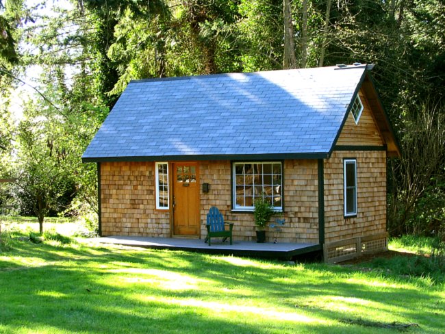 14x24 backyard studio office with a wood deck at the entrance