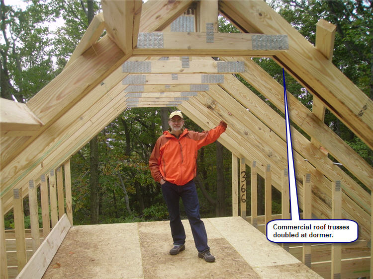roof framing and the attic dormer nearing completion