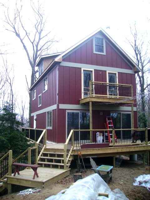 20 foot wide Universal Cottage sided in cement board with a belly band trim