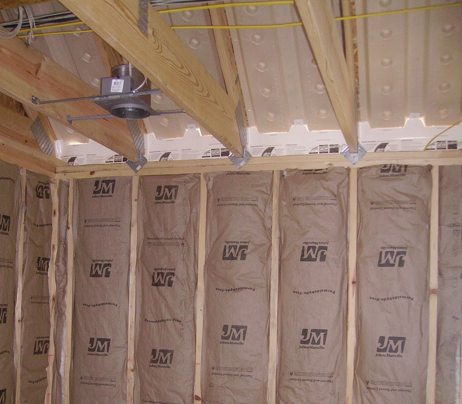 vent baffles for the roof insulation in the attic living space