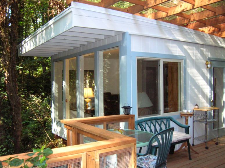 the finished 12x14 home office with a shed roof, seen across the deck