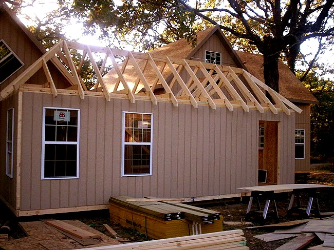 back side of the hip roofed element that connects the two cottages