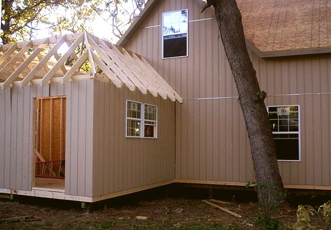 new rafters over the connecting element between the two cottages