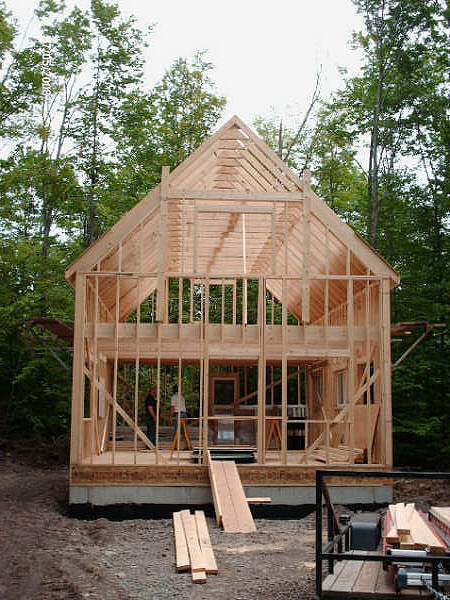 site built trusses framing the 20 foot wide 1-1/2 story cabin