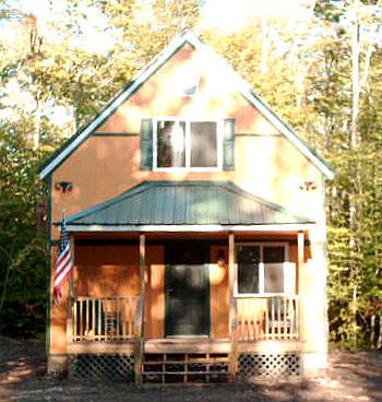 front porch of the completed 20x34 cottage cabin