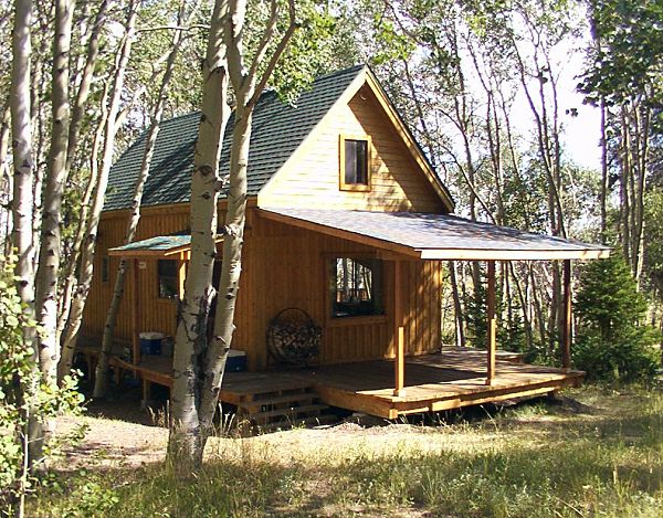 owner built 14x24 cabin in the woods in Wyoming