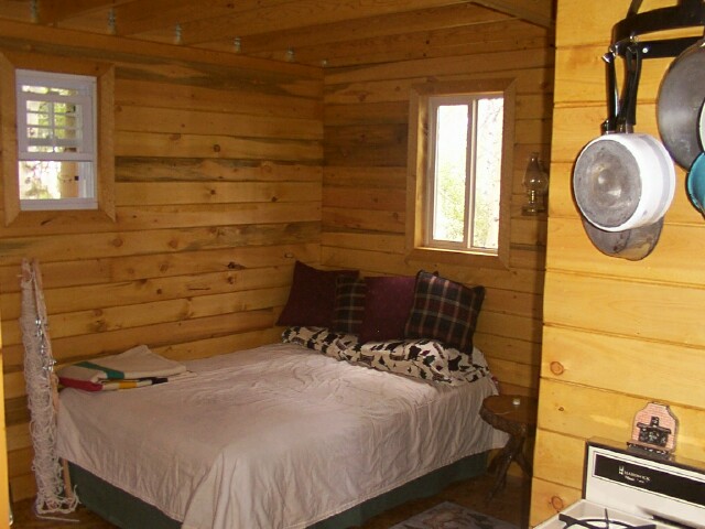 main floor bedroom corner of the 14x24 cabin
