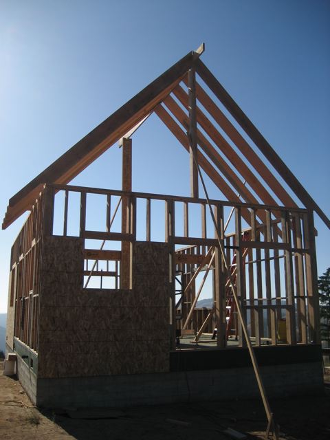 gable end of the frame with the ridge and rafters going up over the 1-1/2 story walls